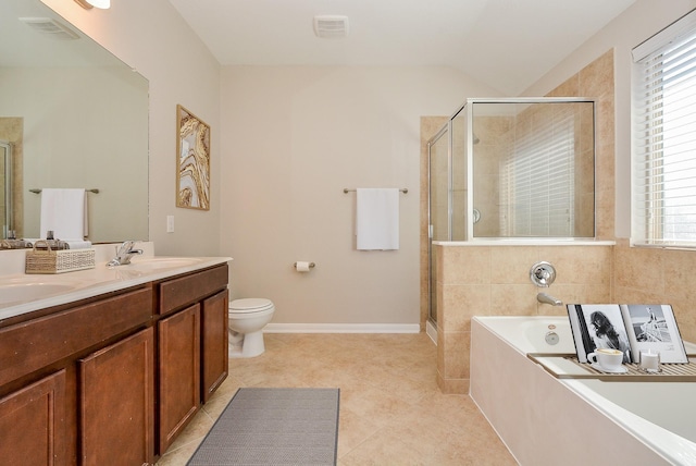 full bathroom featuring tile patterned flooring, shower with separate bathtub, vanity, and toilet