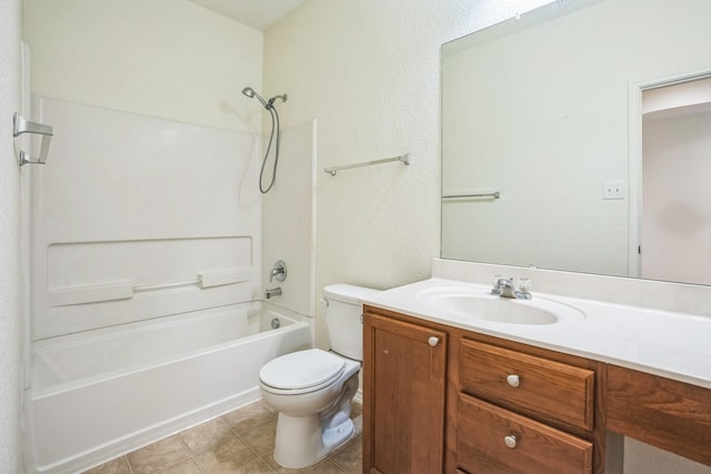 full bathroom featuring tile patterned floors, vanity, toilet, and bathing tub / shower combination