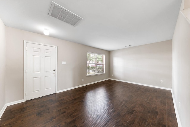 entryway with dark hardwood / wood-style floors