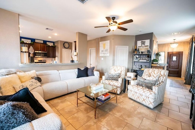 living room with ceiling fan