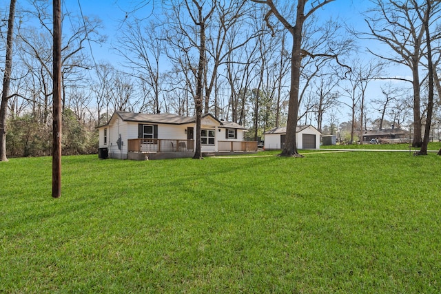 exterior space with a yard, covered porch, and a garage