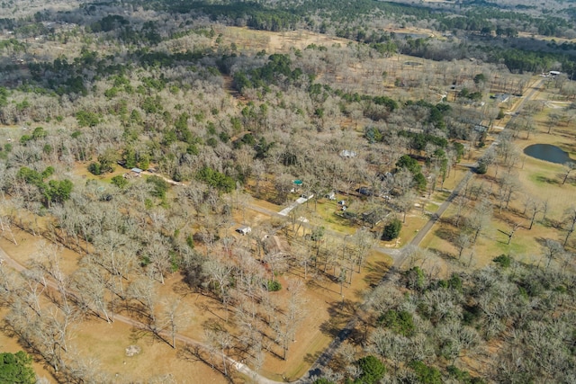 birds eye view of property featuring a rural view