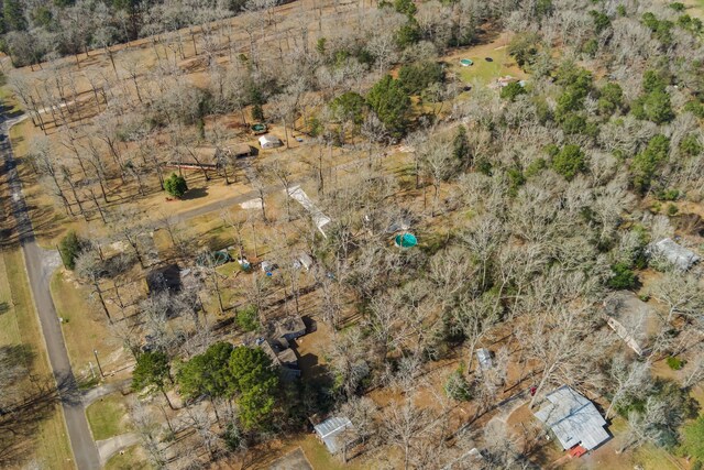 birds eye view of property with a rural view