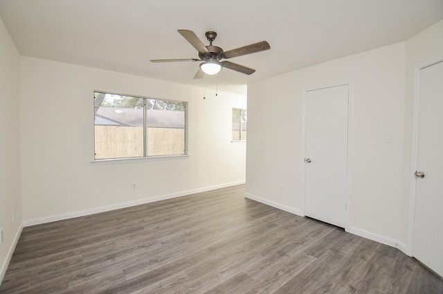 unfurnished bedroom featuring hardwood / wood-style flooring and ceiling fan