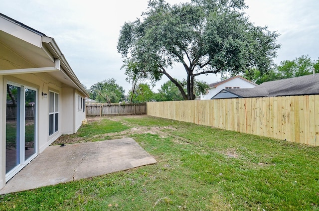 view of yard with a patio area