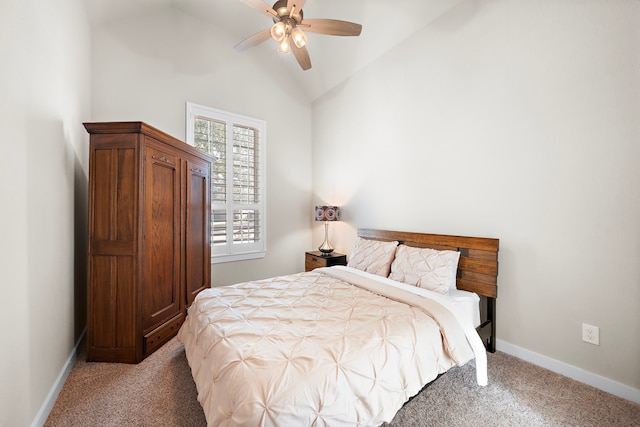 bedroom featuring vaulted ceiling, carpet floors, and ceiling fan