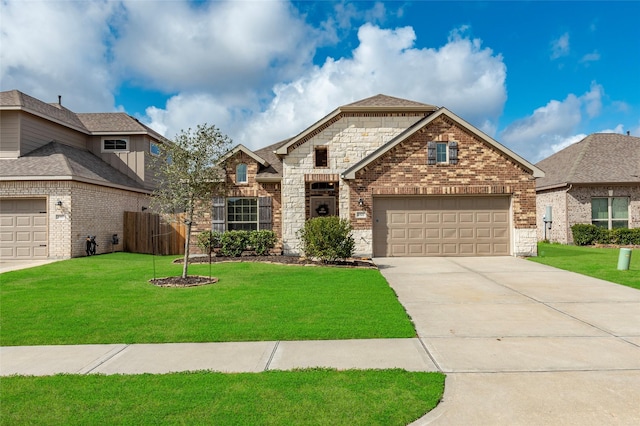 view of front facade with a garage and a front lawn