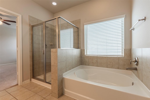 bathroom featuring ceiling fan, tile patterned floors, and separate shower and tub