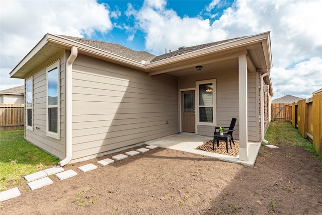 back of house featuring a patio area