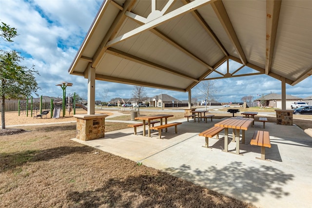 view of property's community with a playground and a gazebo