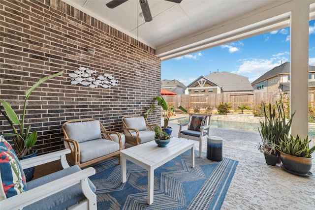 view of patio / terrace featuring an outdoor living space and ceiling fan