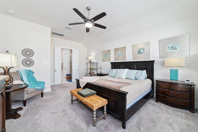 bedroom with ceiling fan and light colored carpet