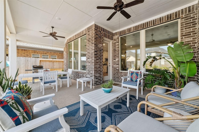 view of patio featuring an outdoor living space and ceiling fan