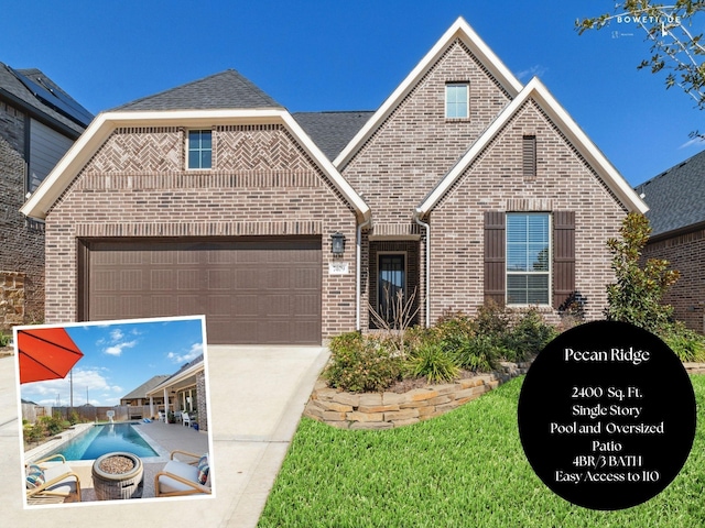 view of front of property featuring a garage