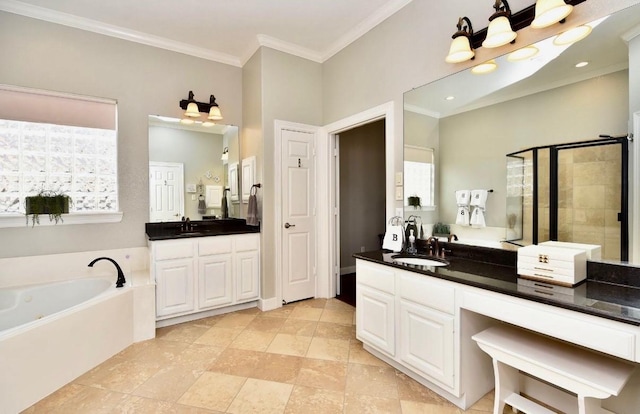 full bathroom featuring ornamental molding, a sink, a shower stall, and a bath