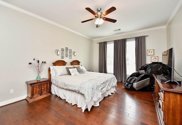 bedroom featuring dark wood-style floors, baseboards, visible vents, and crown molding