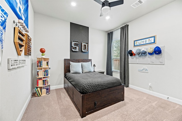 bedroom featuring visible vents, baseboards, carpet, recessed lighting, and a ceiling fan