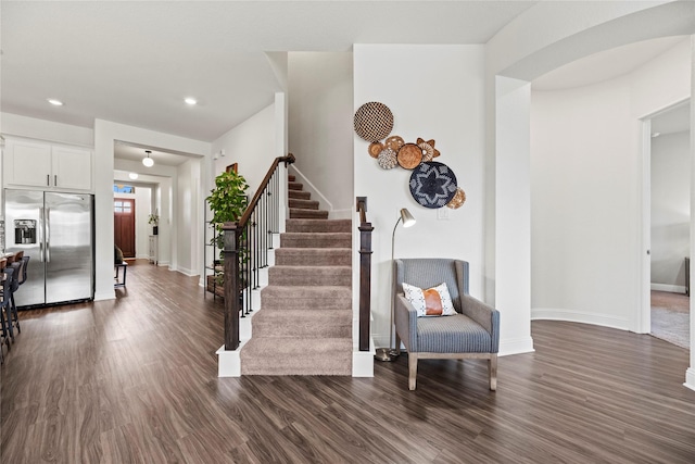 entrance foyer featuring recessed lighting, stairway, baseboards, and dark wood finished floors