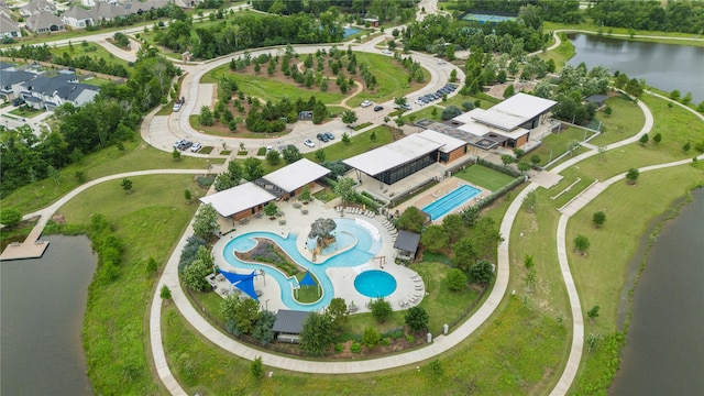 bird's eye view featuring a water view and a residential view