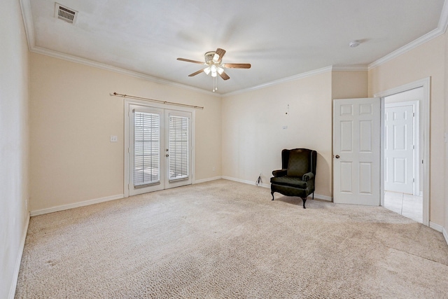 sitting room featuring ornamental molding, light carpet, ceiling fan, and french doors