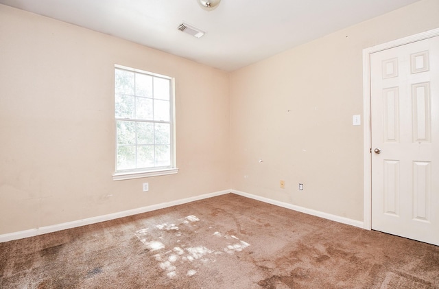 view of carpeted spare room