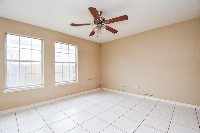 unfurnished room with ceiling fan