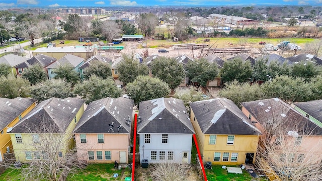 birds eye view of property with a residential view