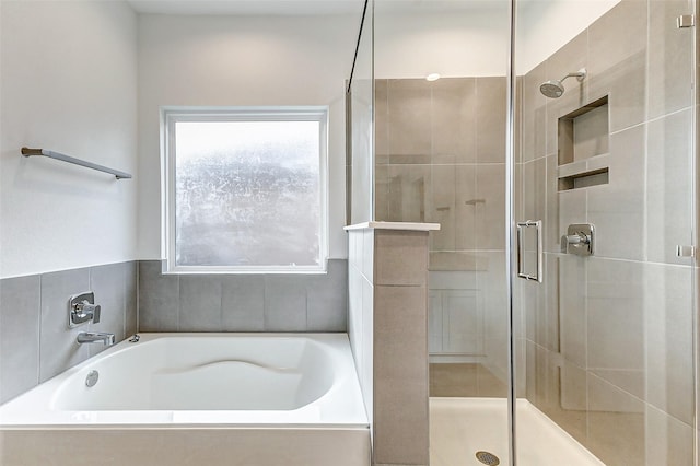 bathroom with independent shower and bath