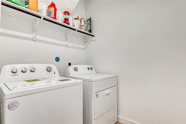 laundry area featuring washing machine and dryer