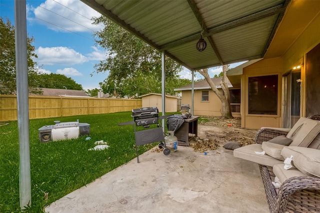 view of patio with a storage unit