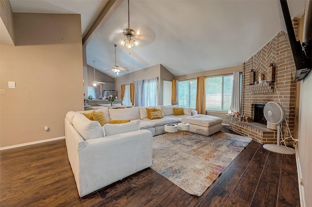 living room featuring beamed ceiling, high vaulted ceiling, a fireplace, and dark wood-type flooring