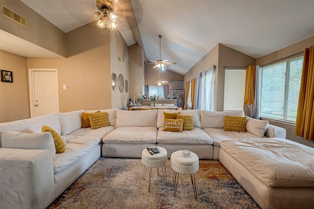 living room with lofted ceiling and ceiling fan