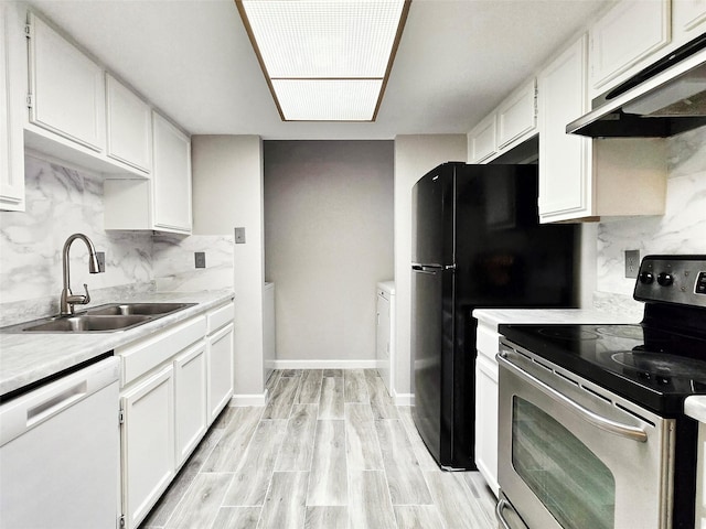 kitchen featuring sink, white cabinets, stainless steel range with electric cooktop, decorative backsplash, and white dishwasher