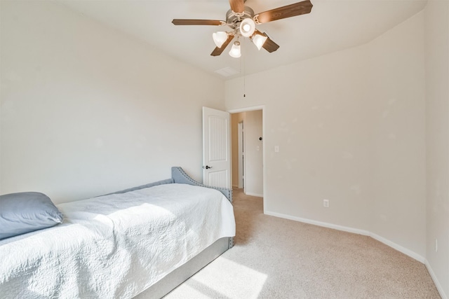 bedroom featuring light colored carpet and ceiling fan