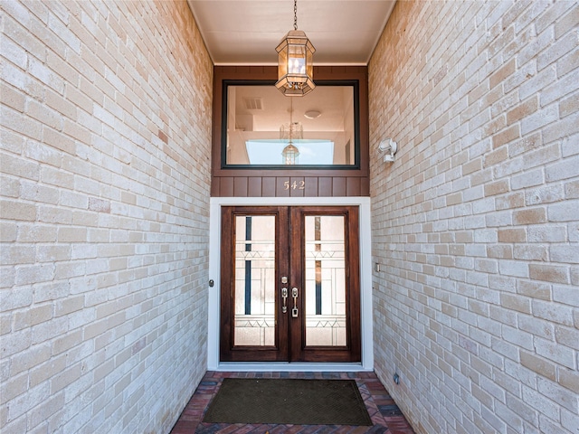 doorway to property featuring french doors