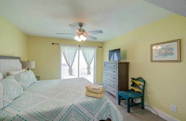 bedroom with ceiling fan and light wood-type flooring