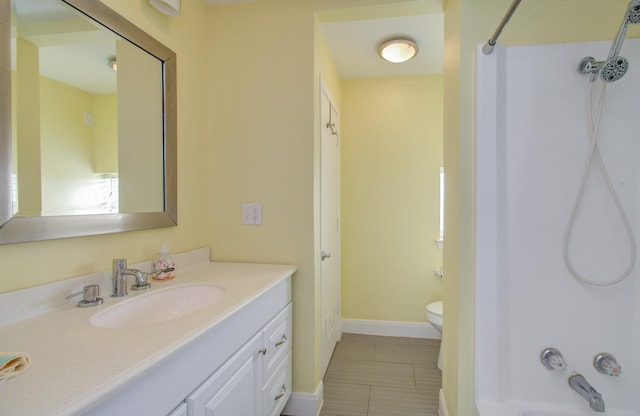 full bathroom with vanity, tile patterned flooring, bathtub / shower combination, and toilet