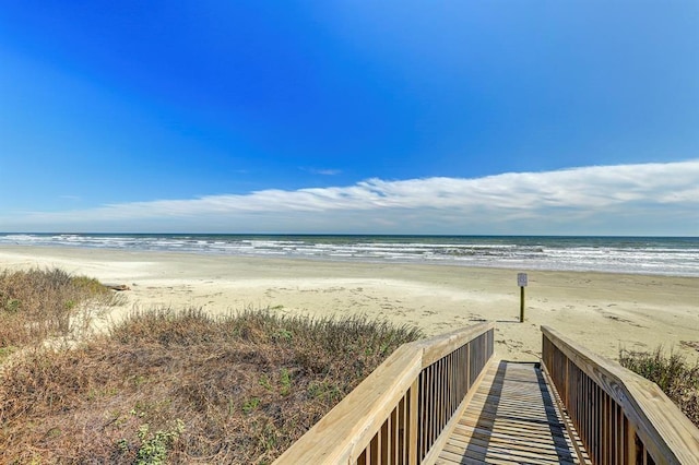 view of water feature with a beach view