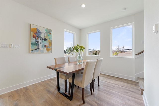 dining room featuring light wood-type flooring