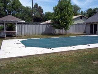 view of pool with a gazebo and a lawn