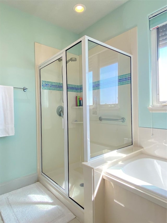 bathroom with independent shower and bath