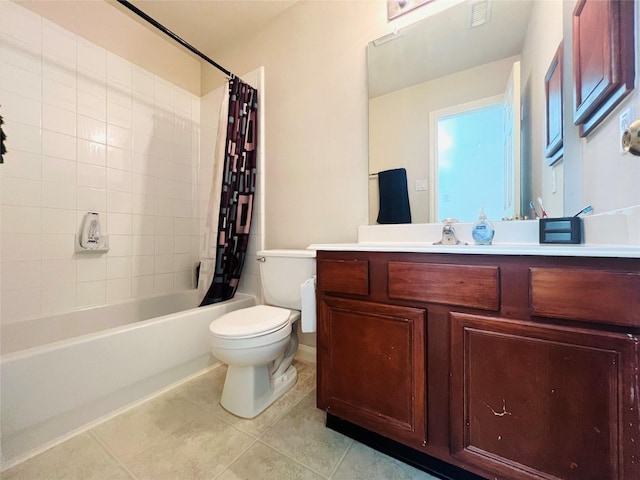 full bathroom featuring shower / tub combo, vanity, tile patterned flooring, and toilet