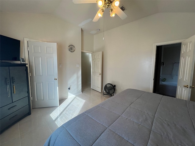 bedroom featuring light tile patterned floors, vaulted ceiling, and ceiling fan