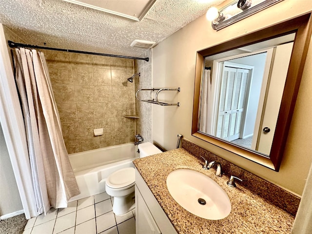 full bathroom featuring tile patterned floors, toilet, a textured ceiling, vanity, and shower / bath combo