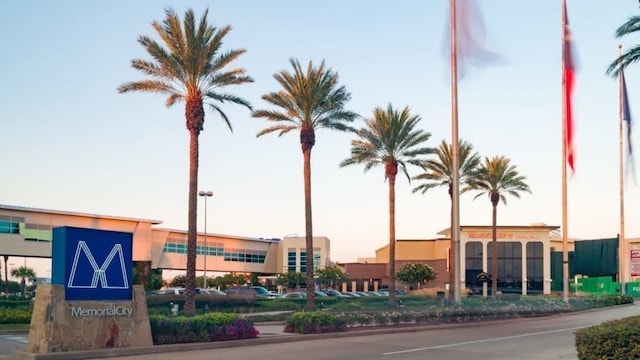 view of outdoor building at dusk