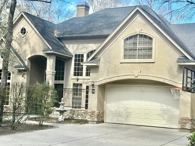 view of front of property featuring a garage