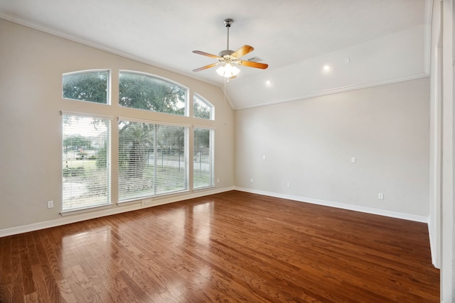 unfurnished room featuring wood-type flooring, ceiling fan, and vaulted ceiling