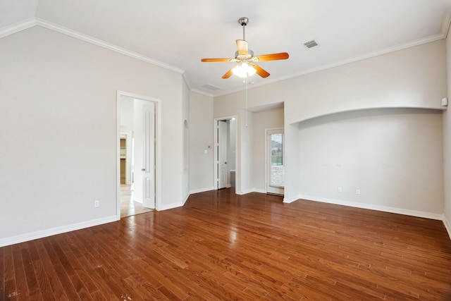 spare room featuring ceiling fan, ornamental molding, and dark hardwood / wood-style floors