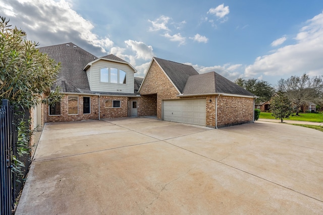 view of front of property featuring a garage