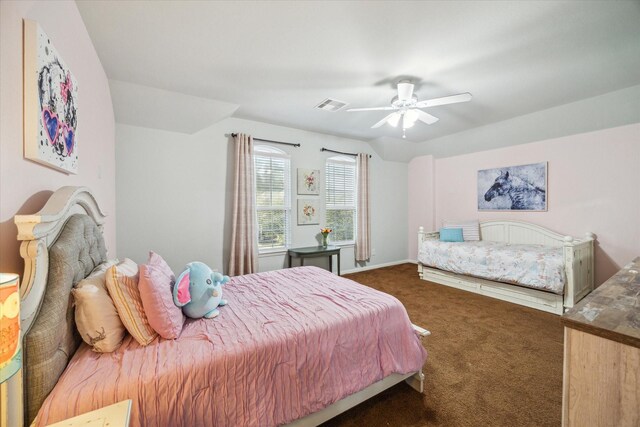 carpeted bedroom featuring ceiling fan and lofted ceiling